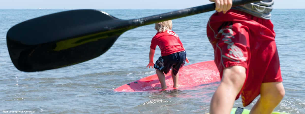 Children paddleboarding (photo by Matt Jessop/Visit Cornwall