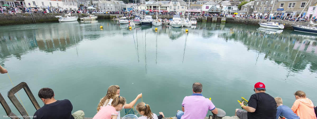 Family fishing from Padstow harbour (photo by Matt Jessop/Visit Cornwall